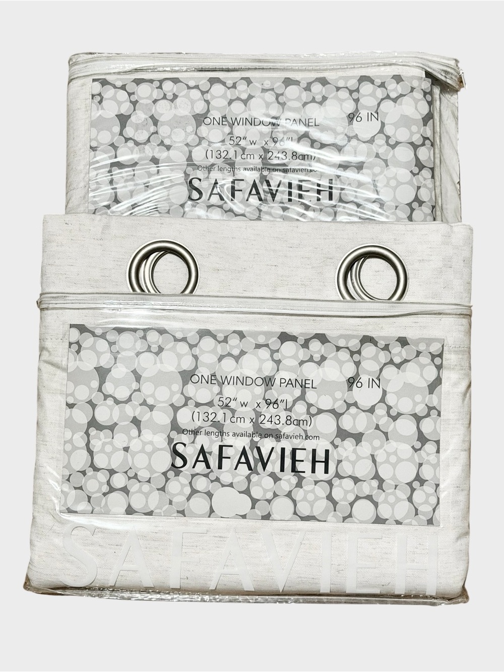 Two Safavieh Ivory Textured Silver Grommet Blackout Window Panels